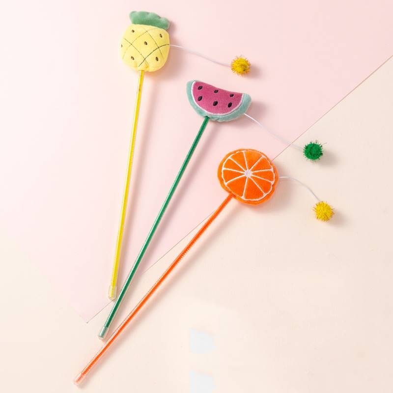 Colorful funny cat sticks in the form of fruit