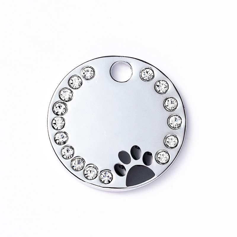 Round pet tag with dog footprint pattern