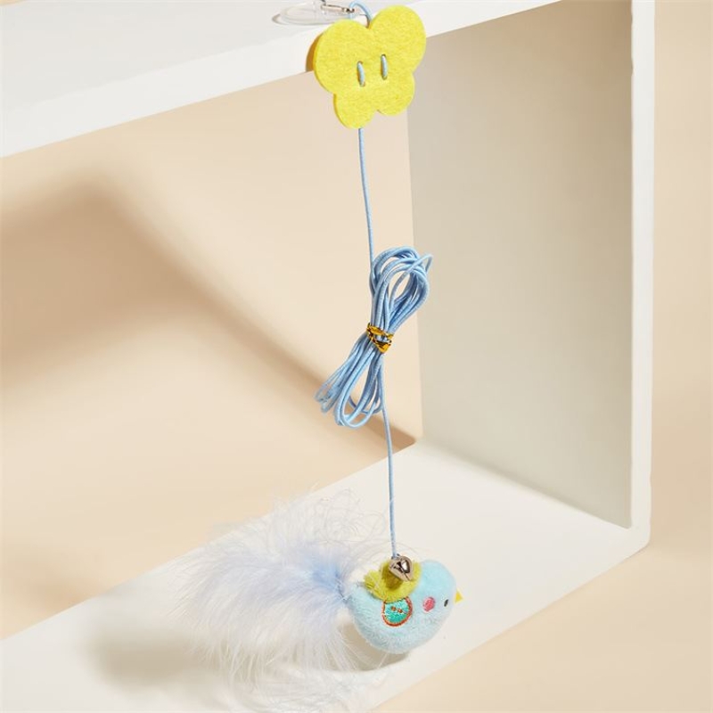 Cat toy hanging in the form of a dragonfly bird